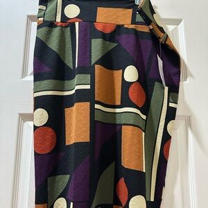 LuLaRoe Pencil Skirt in Black with Orange, Olive, Purple & Cream Geometric Print